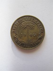 Монета Британская Западная Африка 1 шиллинг 1940
